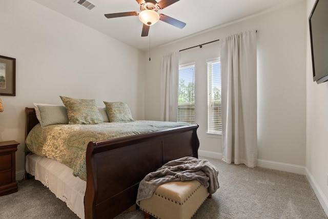 1002 Timberland Bay Ct, Pinehurst, TX 77362 - carpeted bedroom featuring visible vents, baseboards, and ceiling fan