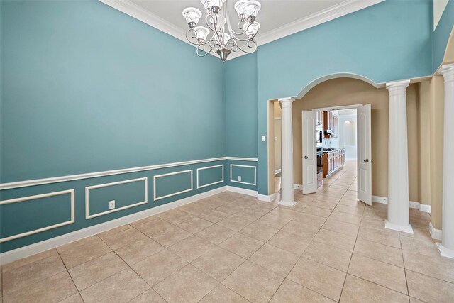 11812 Sea Shadow Bnd, Pearland, TX 77584 - unfurnished room with arched walkways, light tile patterned floors, ornamental molding, and a chandelier