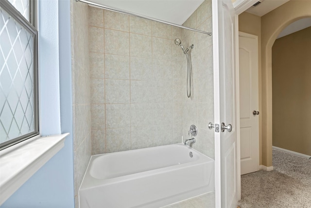 11812 Sea Shadow Bnd, Pearland, TX 77584 - bathroom with bathing tub / shower combination and baseboards