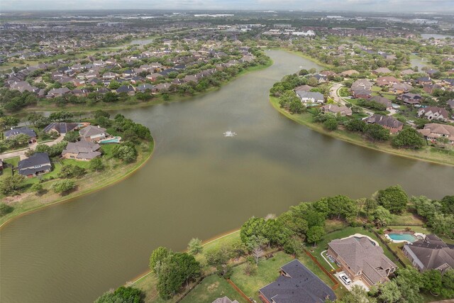 11812 Sea Shadow Bnd, Pearland, TX 77584 - aerial overview of property's location featuring a nearby body of water and nearby suburban area