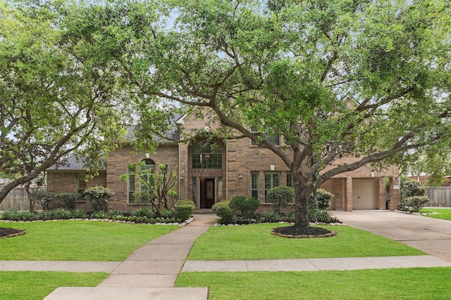 11812 Sea Shadow Bnd, Pearland, TX 77584 - view of front of property with driveway, brick siding, and a garage