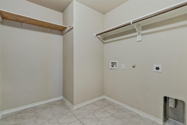 1056 Decker Dr, Fate, TX 75189 - clothes washing area with washer hookup, electric dryer hookup, laundry area, baseboards, and gas dryer hookup