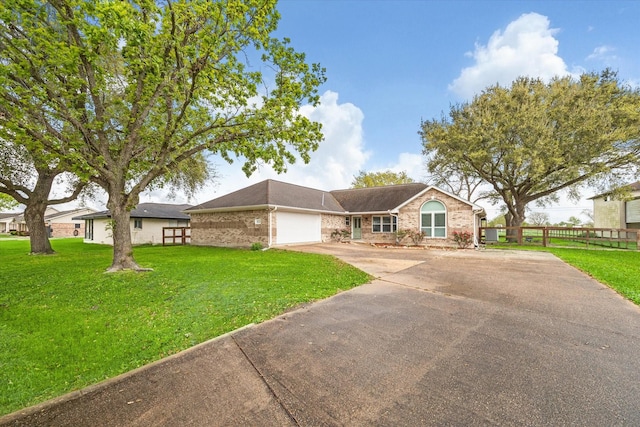 1613 Willow View St, La Porte, TX 77571 - ranch-style home with concrete driveway, a garage, and brick siding
