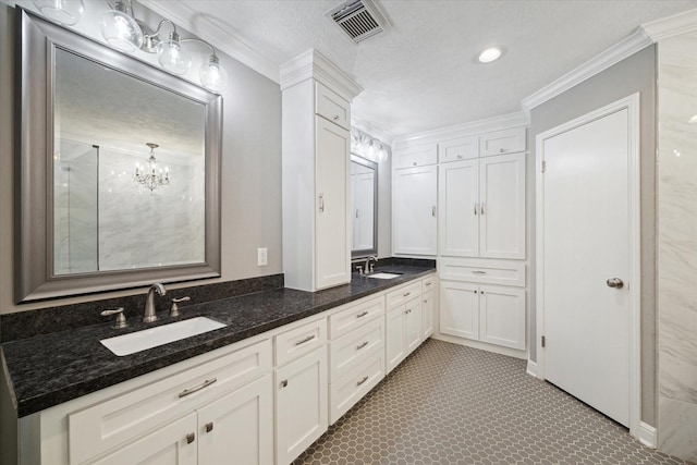 1613 Willow View St, La Porte, TX 77571 - bathroom featuring ornamental molding, double vanity, and a chandelier
