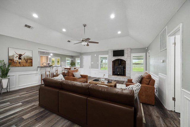 1613 Willow View St, La Porte, TX 77571 - living area with a decorative wall, lofted ceiling, dark wood finished floors, a ceiling fan, and healthy amount of natural light