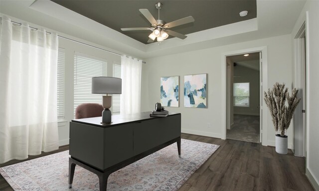 305 E 40th St Unit B, Houston, TX 77018 - home office featuring a raised ceiling, dark wood-type flooring, and a ceiling fan