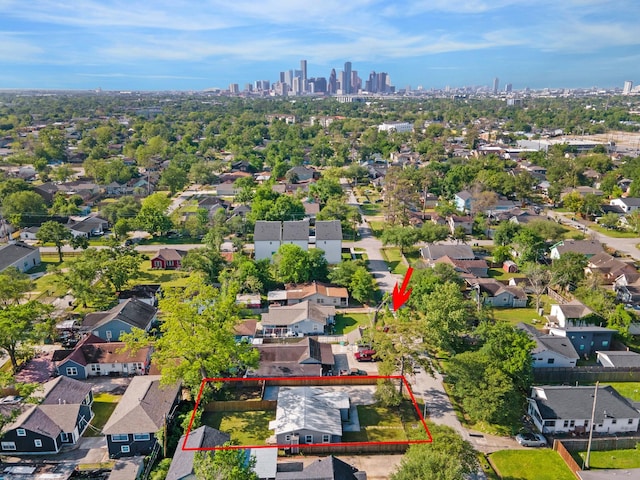 bird's eye view featuring a residential view and a view of city
