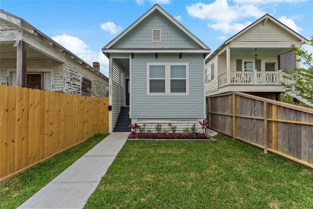 3513 Ursuline St, Galveston, TX 77550 - rear view of property featuring fence and a yard