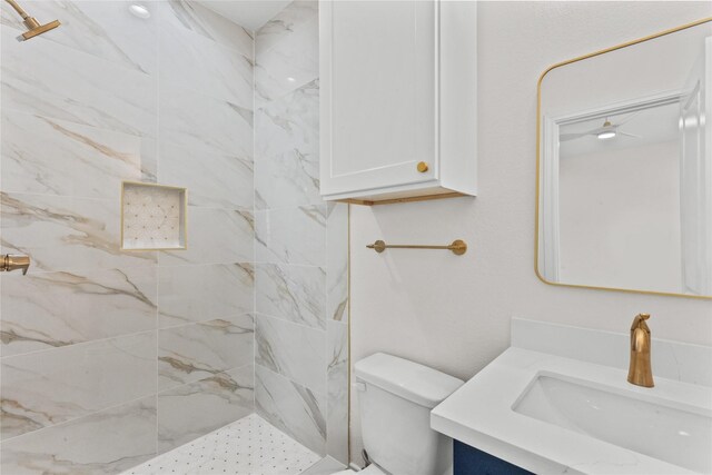 3513 Ursuline St, Galveston, TX 77550 - bathroom with toilet, vanity, and tiled shower