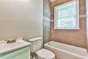 6657 Stearns St, Houston, TX 77021 - bathroom with vanity, toilet, and tub / shower combination