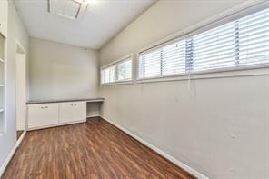 6657 Stearns St, Houston, TX 77021 - unfurnished room with dark wood-style flooring and baseboards