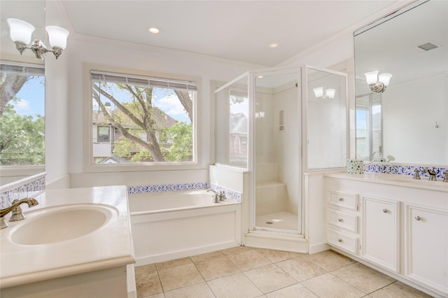 full bathroom featuring tile patterned flooring, ornamental molding, a stall shower, and vanity