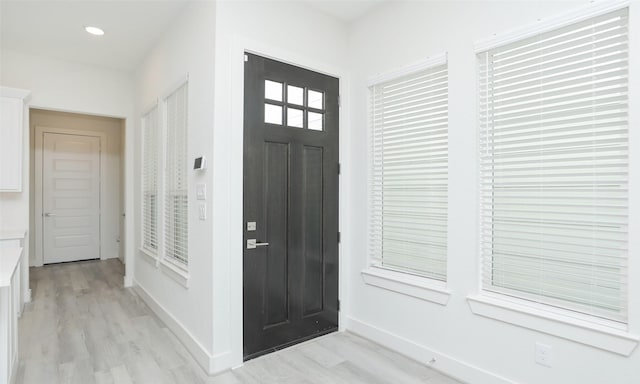 119 E 43rd St Unit A, Houston, TX 77018 - foyer entrance with recessed lighting, light wood-style floors, and baseboards