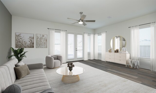 121 E 43rd St Unit B, Houston, TX 77018 - living room with dark wood finished floors, ceiling fan, and a healthy amount of sunlight