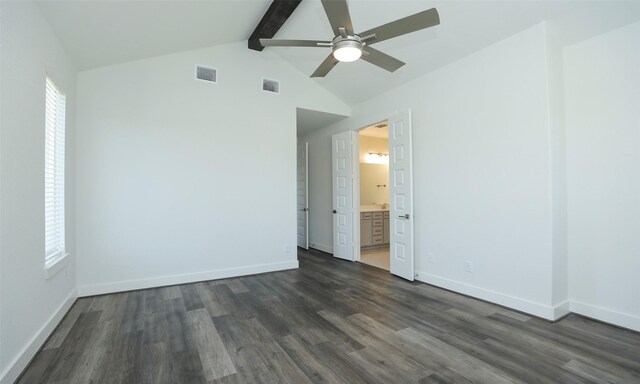 121 E 43rd St Unit B, Houston, TX 77018 - unfurnished bedroom with visible vents, baseboards, lofted ceiling with beams, and dark wood finished floors