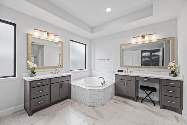 9010 Pleasant Cv, Missouri City, TX 77459 - full bathroom featuring marble finish floor, a bath, and a sink