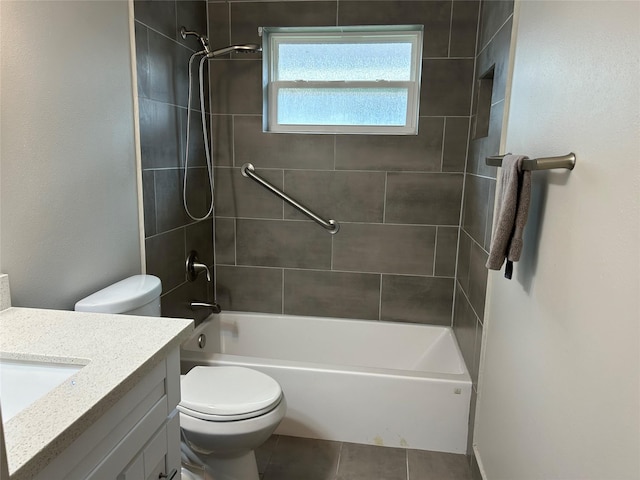 full bathroom with tile patterned floors, toilet, vanity, and bathing tub / shower combination