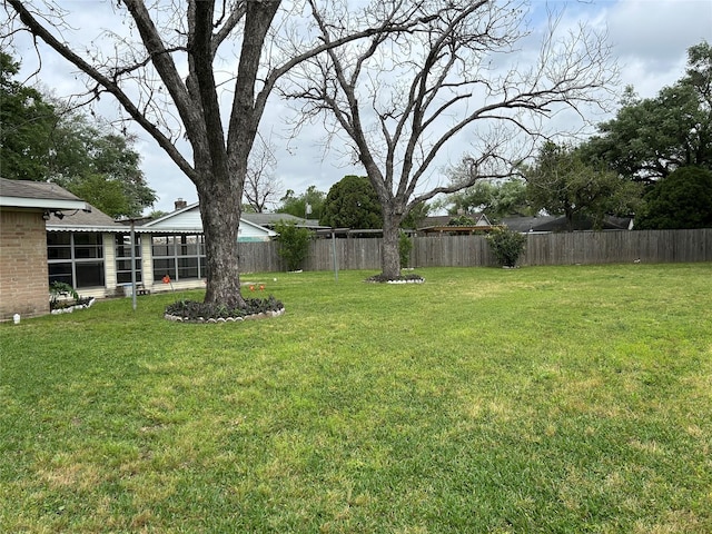 view of yard with fence