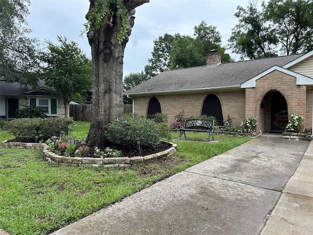 6018 Rena St, Houston, TX 77092 - single story home featuring brick siding, a chimney, and a shingled roof