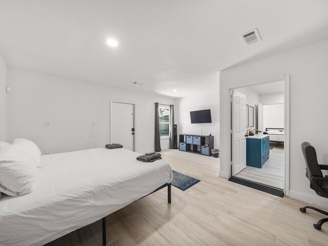 8007 Beluche Dr, Galveston, TX 77551 - bedroom with baseboards, visible vents, recessed lighting, and light wood-type flooring