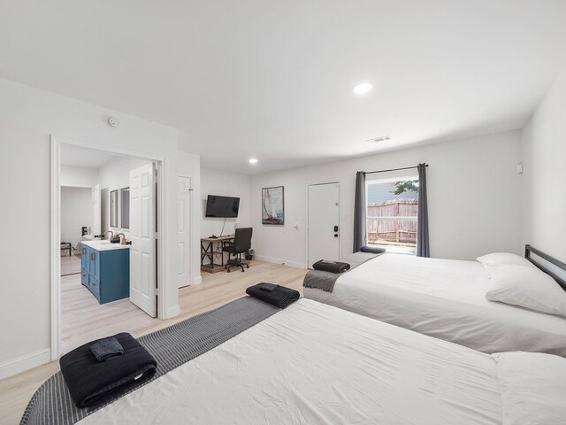 8007 Beluche Dr, Galveston, TX 77551 - bedroom featuring baseboards, light wood-style flooring, visible vents, and recessed lighting