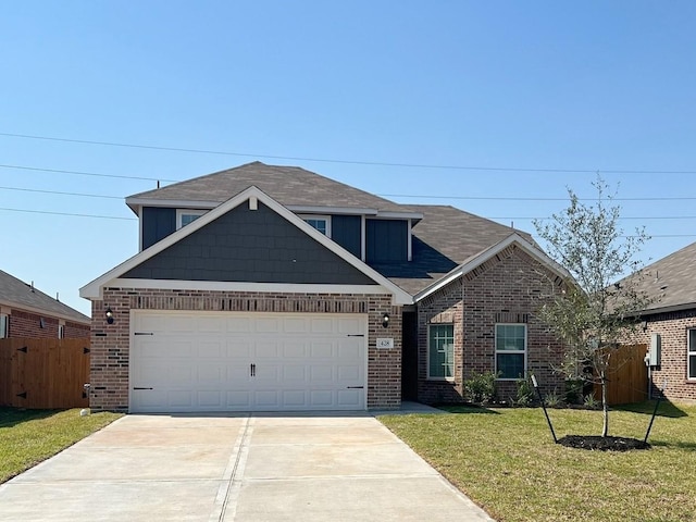 traditional-style house with fence, an attached garage, concrete driveway, brick siding, and a front lawn