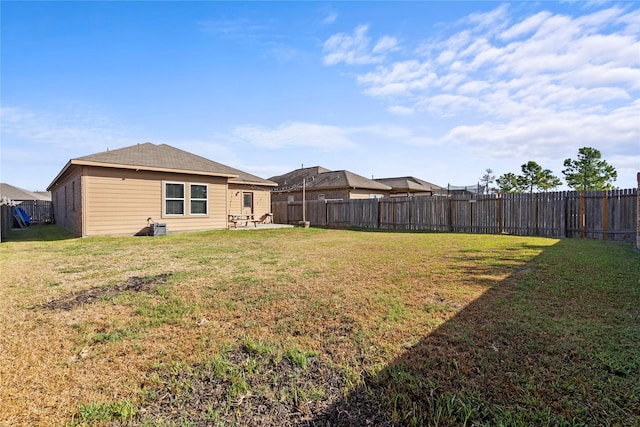 7529 Topaz Way, Texas City, TX 77591 - view of yard with a fenced backyard and a patio area