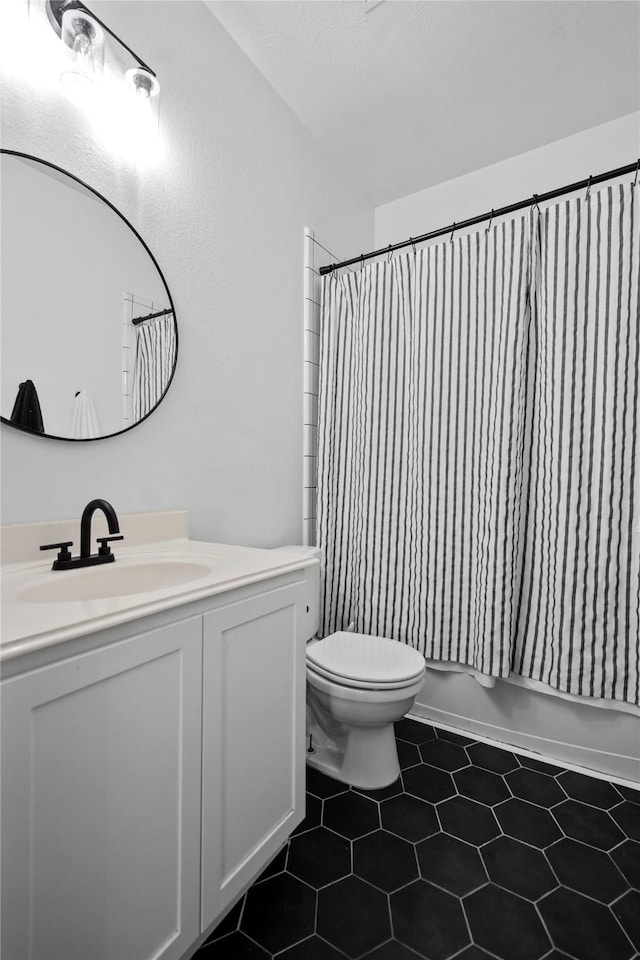 7529 Topaz Way, Texas City, TX 77591 - bathroom with toilet, shower / bath combination with curtain, tile patterned flooring, and vanity