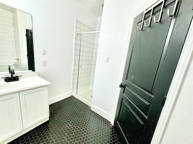 7529 Topaz Way, Texas City, TX 77591 - full bathroom featuring vanity, a stall shower, and baseboards