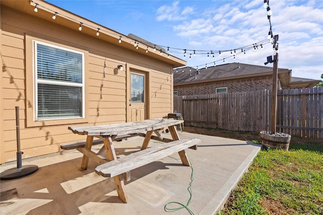 7529 Topaz Way, Texas City, TX 77591 - view of patio / terrace featuring outdoor dining area and fence