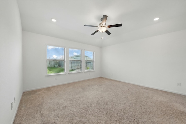 unfurnished room featuring a ceiling fan, light carpet, baseboards, and recessed lighting