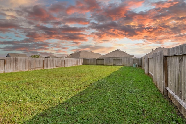 view of yard featuring a fenced backyard