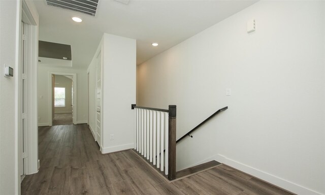 910 W 21st St Unit B, Houston, TX 77008 - corridor with wood finished floors, visible vents, baseboards, and an upstairs landing