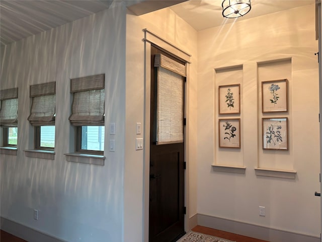 foyer entrance with baseboards