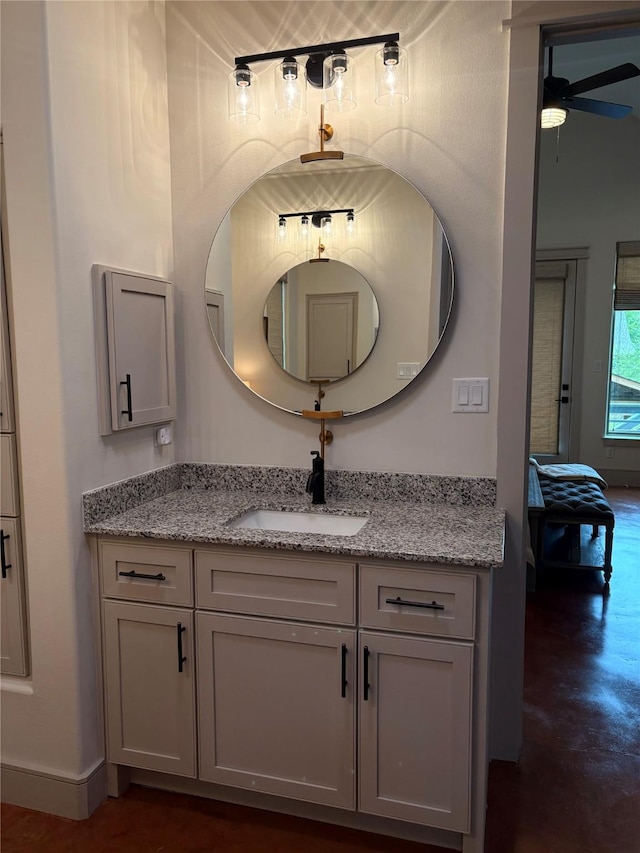 10 Hunters Creek Dr, Huntsville, TX 77340 - bathroom featuring ceiling fan, vanity, and finished concrete flooring