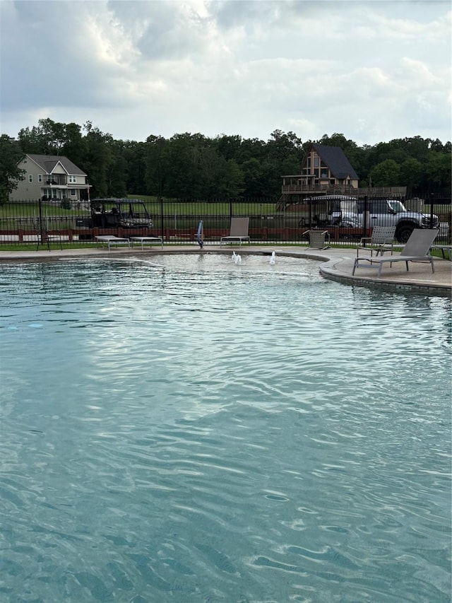 10 Hunters Creek Dr, Huntsville, TX 77340 - community pool featuring fence and a patio