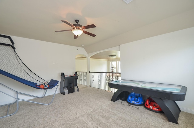 rec room with a ceiling fan and carpet flooring