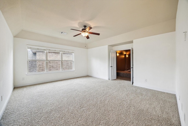27 Tioga Pl, The Woodlands, TX 77375 - spare room with light carpet, ceiling fan, and baseboards