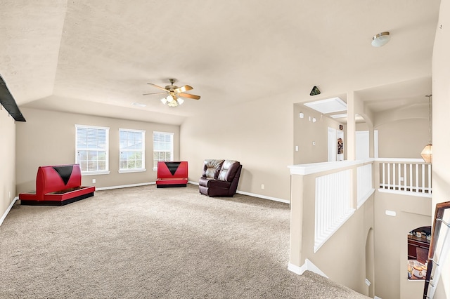 2606 Howlite Ln, Rosharon, TX 77583 - sitting room featuring baseboards, an upstairs landing, carpet floors, and a ceiling fan
