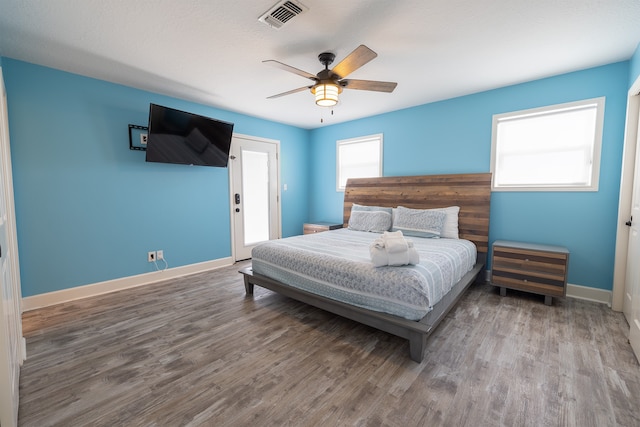 4206 Seabird Dr, Galveston, TX 77554 - bedroom with wood finished floors and a ceiling fan