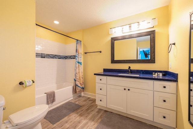 4206 Seabird Dr, Galveston, TX 77554 - bathroom with wood finished floors, vanity, shower / tub combo, and recessed lighting