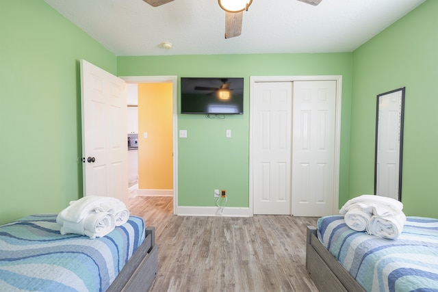 4206 Seabird Dr, Galveston, TX 77554 - bedroom featuring a closet, light wood-style floors, and ceiling fan