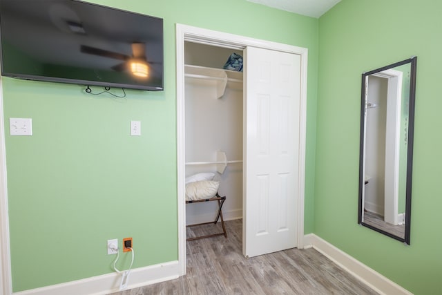 4206 Seabird Dr, Galveston, TX 77554 - unfurnished bedroom with wood finished floors and a closet