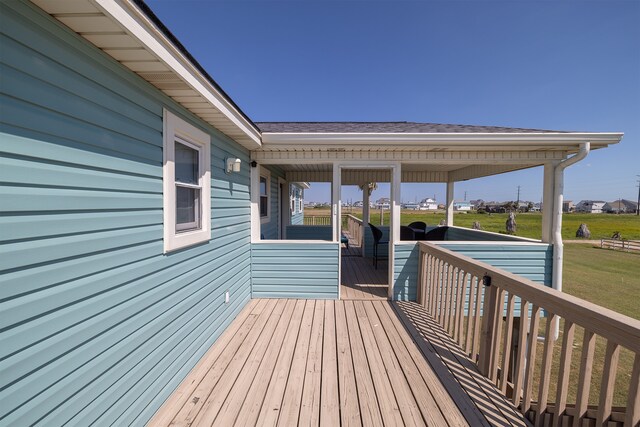 4206 Seabird Dr, Galveston, TX 77554 - wooden terrace featuring a yard