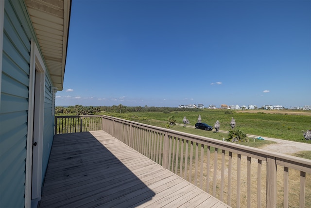 4206 Seabird Dr, Galveston, TX 77554 - wooden deck with a view of rural / pastoral area
