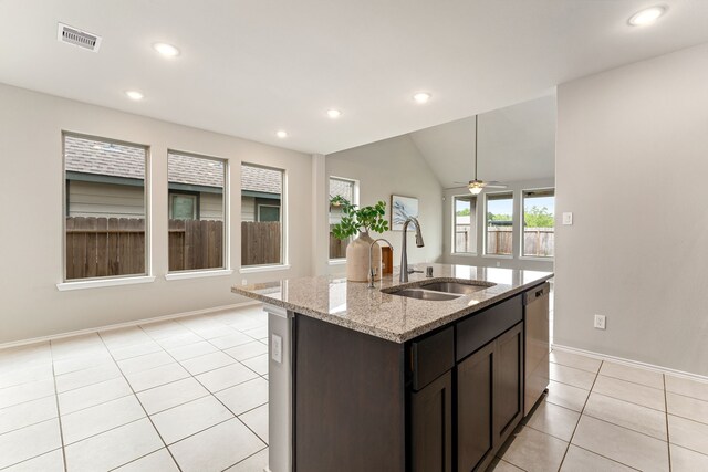 5014 Aspen Orchard Dr, Houston, TX 77066 - kitchen featuring a sink, light tile patterned flooring, recessed lighting, stainless steel dishwasher, and light stone counters