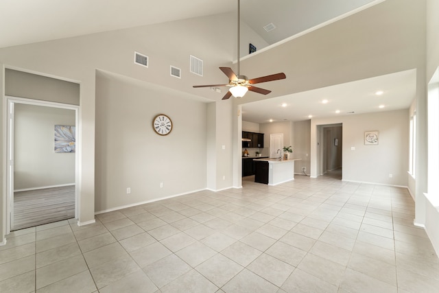 5014 Aspen Orchard Dr, Houston, TX 77066 - unfurnished living room featuring ceiling fan, light tile patterned floors, recessed lighting, baseboards, and high vaulted ceiling