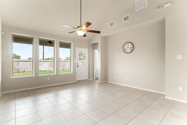 5014 Aspen Orchard Dr, Houston, TX 77066 - spare room with a ceiling fan, healthy amount of natural light, light tile patterned flooring, baseboards, and high vaulted ceiling