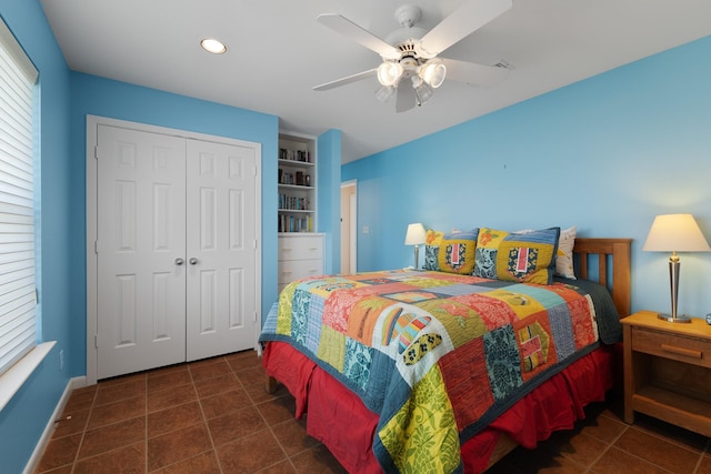 22915 Gulf Dr, Galveston, TX 77554 - tiled bedroom with recessed lighting, baseboards, a closet, and ceiling fan