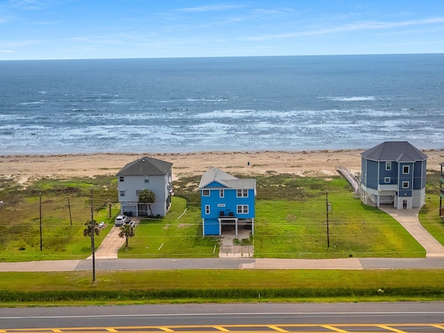 22915 Gulf Dr, Galveston, TX 77554 - drone / aerial view featuring a water view and a view of the beach